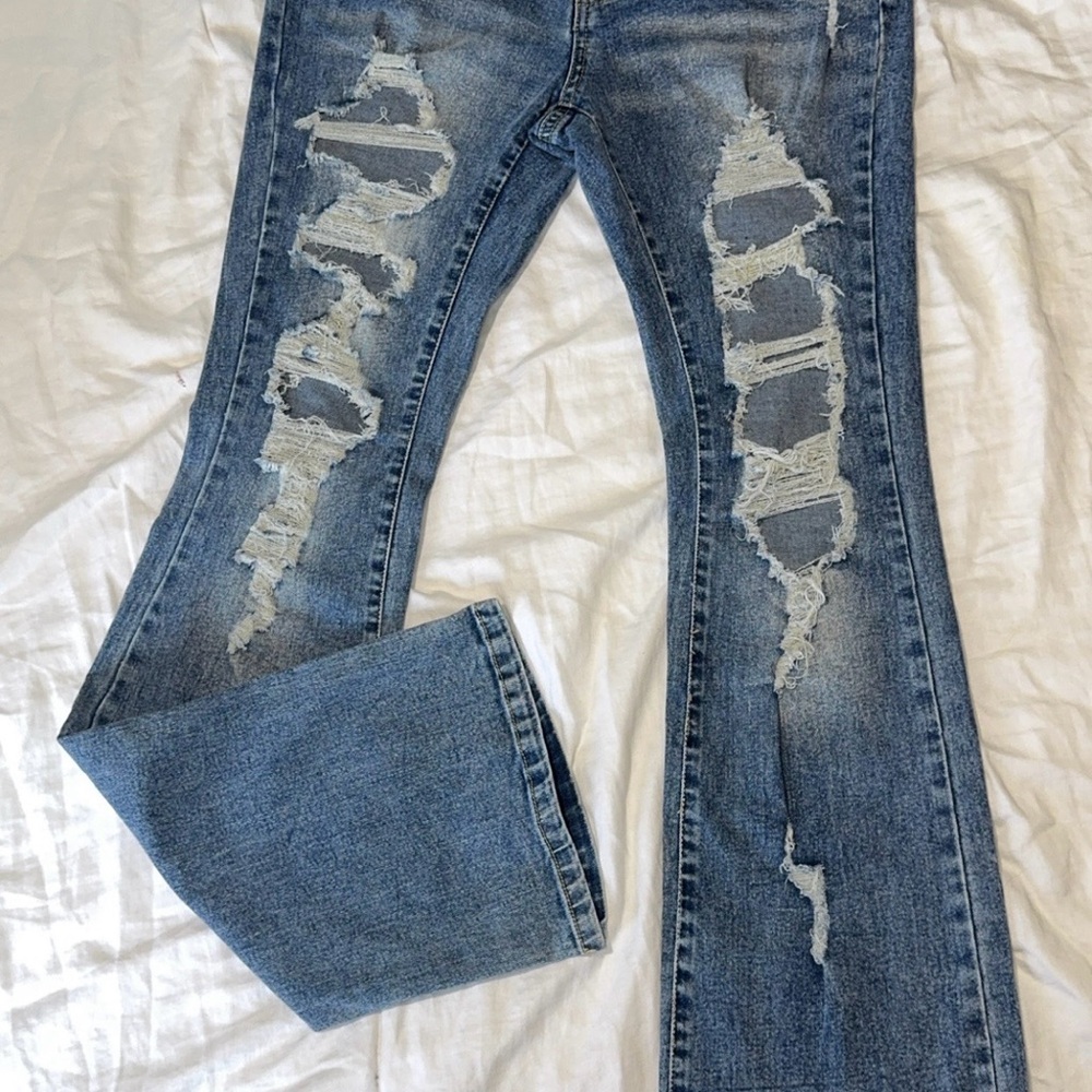SHEIN Light Blue Distressed Flare Jeans